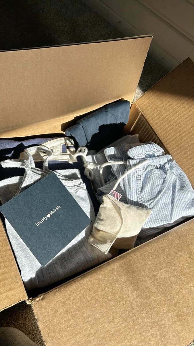 Box with tanks, striped top and navy skirt